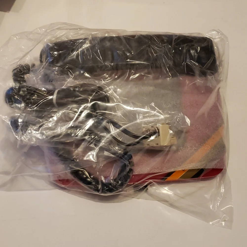 Host Pick Vintage Unisonic NIB Red & Black Sleek Phone